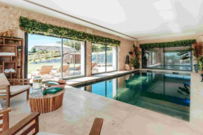 Superbe Villa avec piscine interieure chauffee